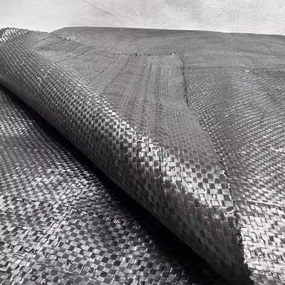 Excelente geotextil tejido de polipropileno negro para filtración y drenaje, ancho 2-6m, fabricado con fibras sintéticas industriales de alta resistencia